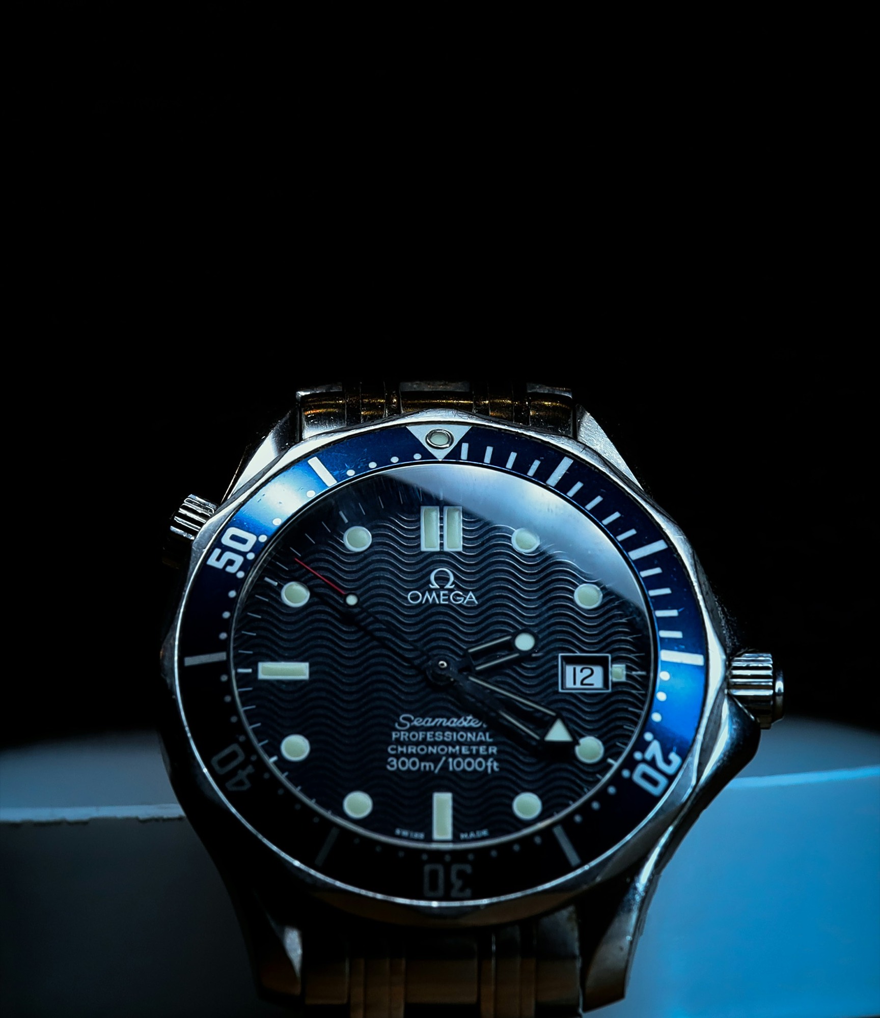 Luxury dive watch on a dark background